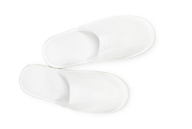 hotel or spa slippers isolated on white, top view, clipping path